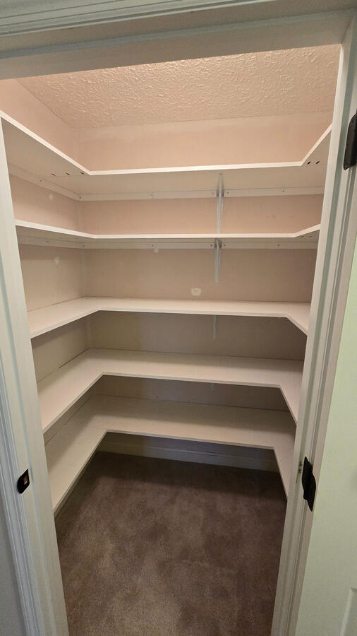 This closet started out as a blank canvas, and Jesse designed the shelves to create a more organized space! What space of yours needs a little help?