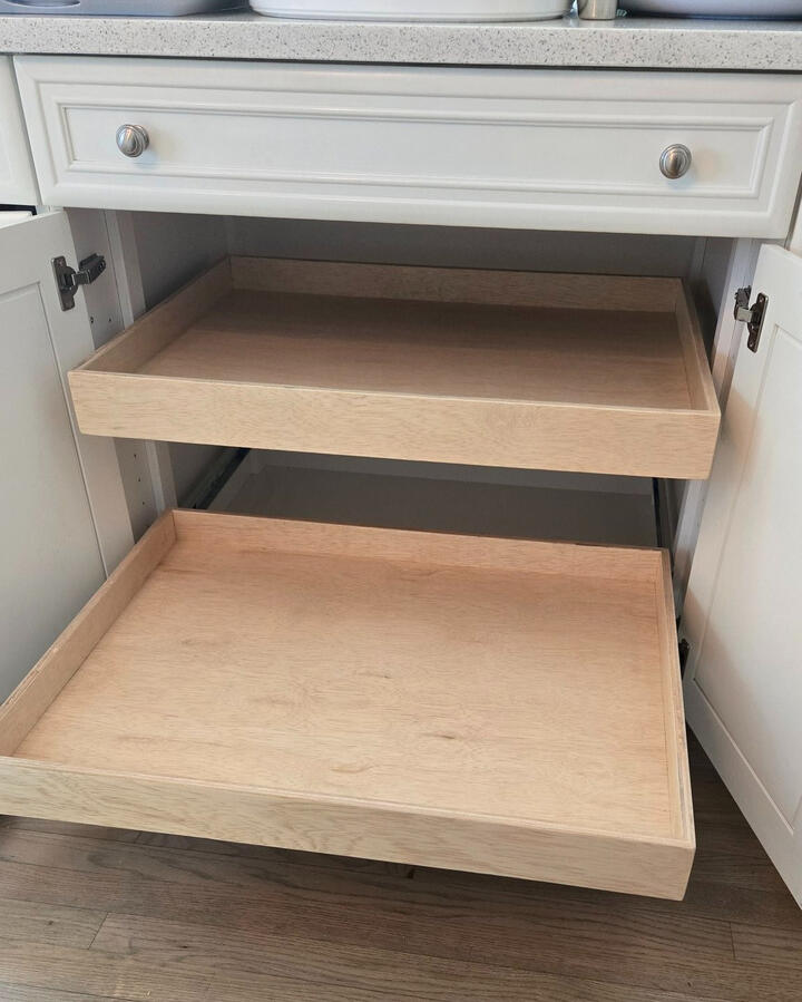 Jesse custom-built these boxes and installed drawer glides for several lower cabinets in this home.