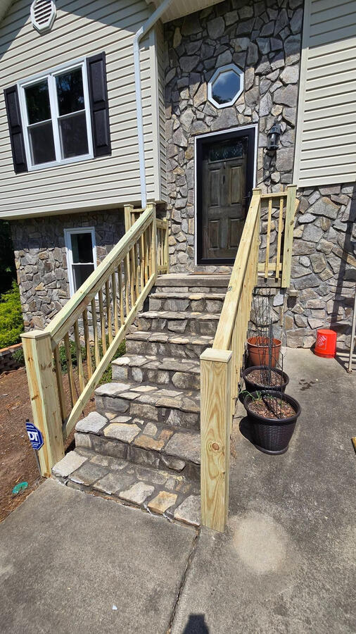 The front of this house got some touch-ups! The stair railings were rotted out and in need of replacement, and Jesse also added shutters.
